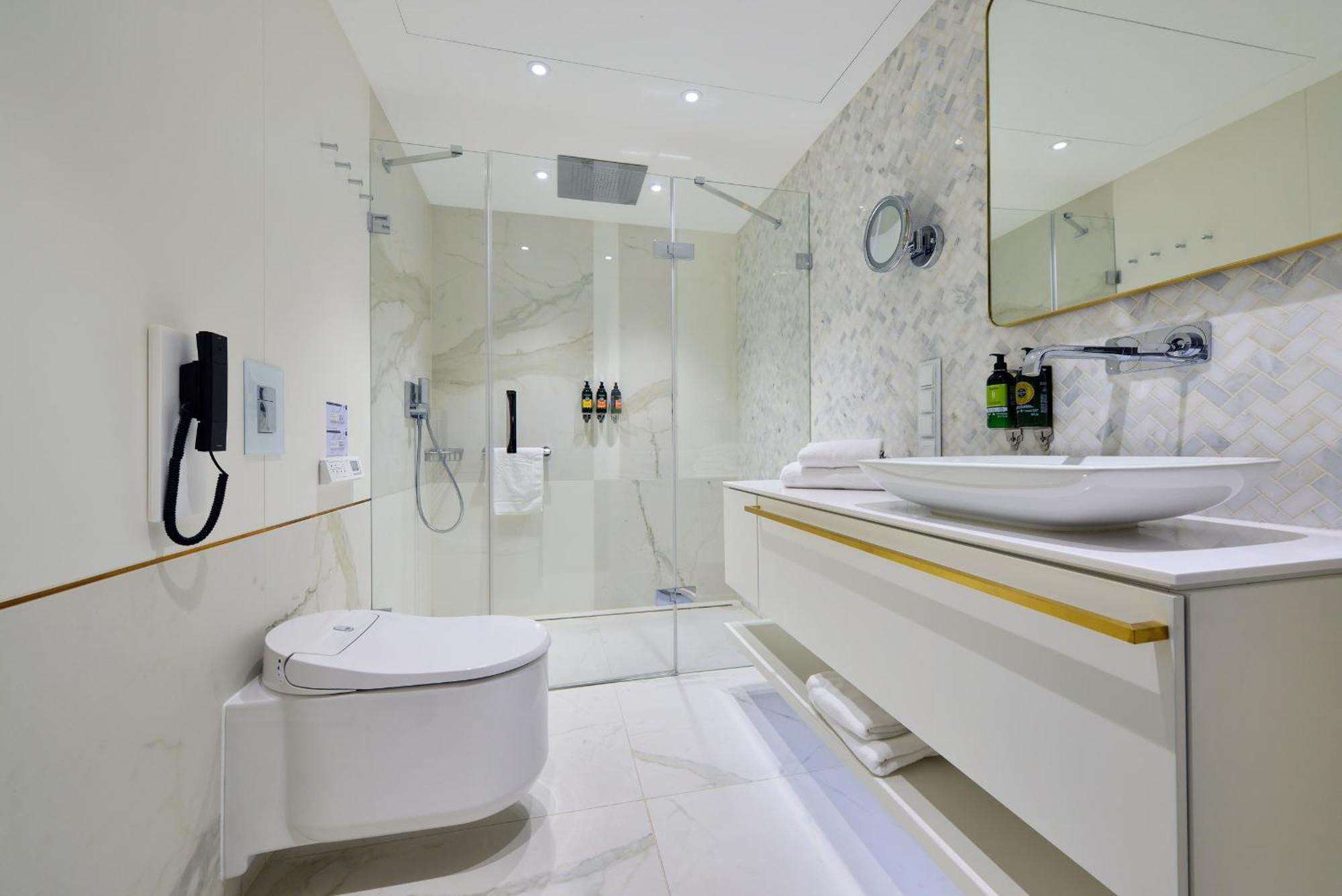 Hotel Ferreus Modern Art Deco Krakow Exterior photo A modern bathroom